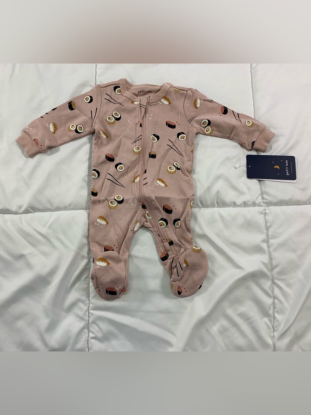 New petit lem footie pyjamas size NB